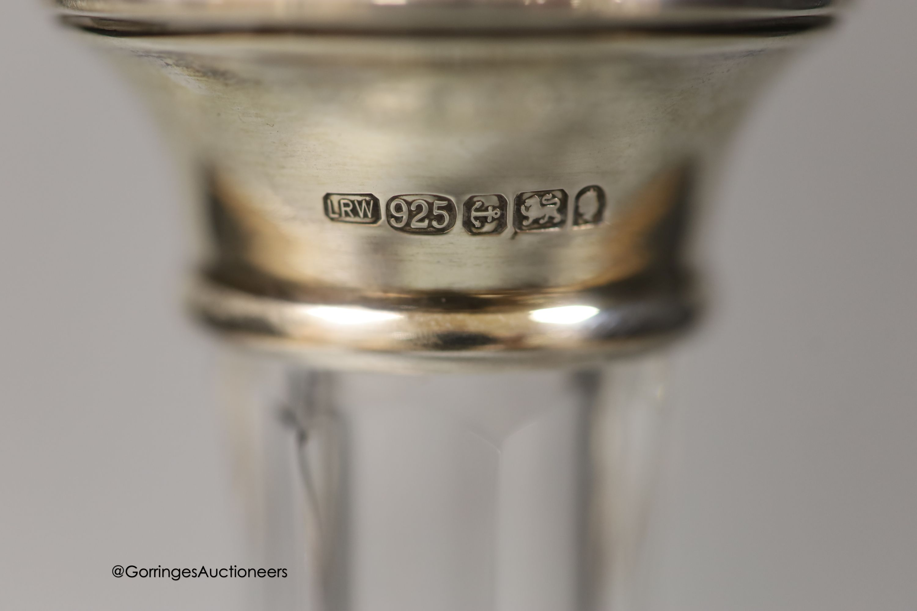 A modern silver collared cut glass ship's decanter, height 28cm.